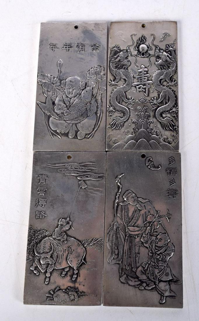 FOUR CHINESE WHITE METAL SCROLL WEIGHTS. 536 grams. 10 cm x 5 cm. (4) (1 of 3)
