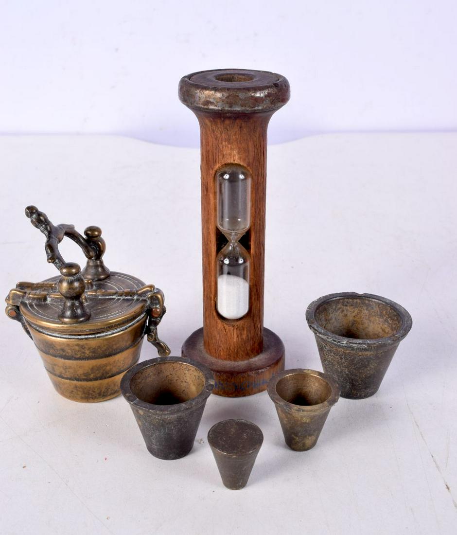 A SET OF GEORGE III BRONZE CASED NOVELTY WEIGHTS together with a treen sand timer. Largest 13 cm hig (1 of 3)