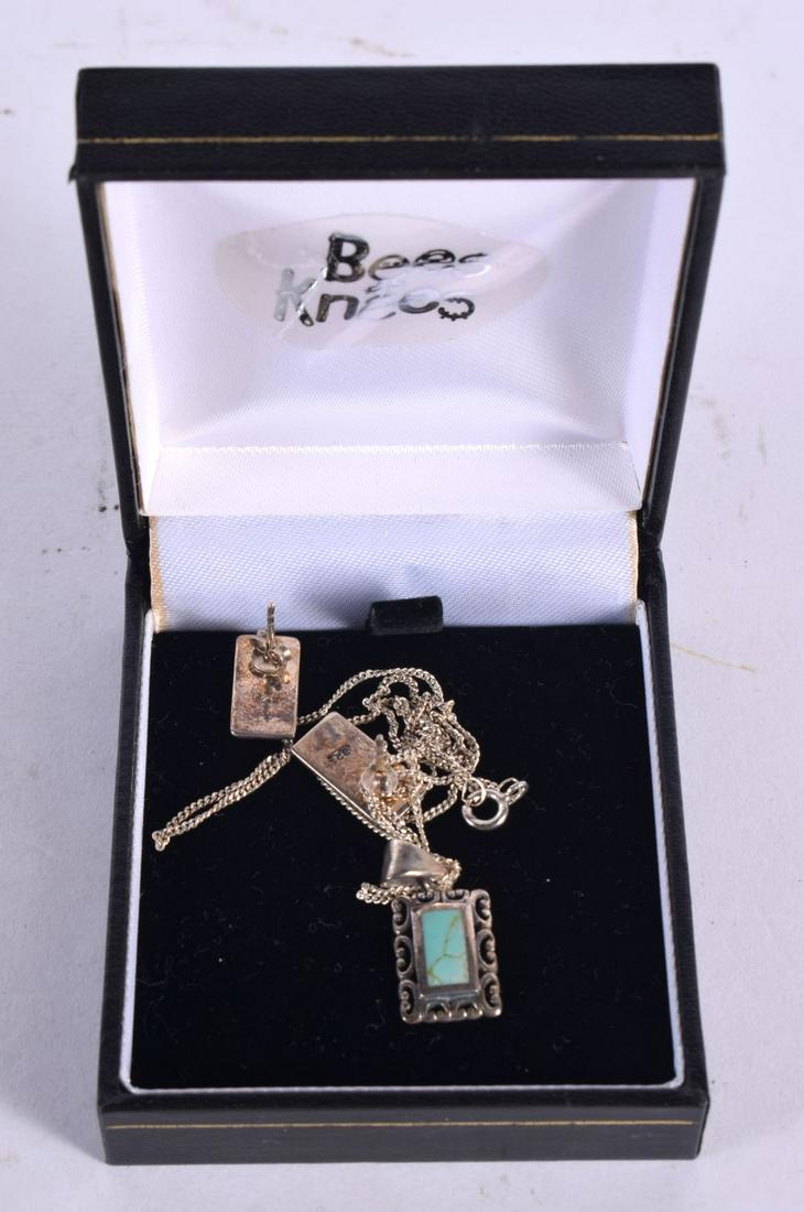 A SILVER AND TURQUOISE PENDANT ON A CHAIN WITH MATCHING EARRINGS. Stamped 925, chain 46cm, Pendant: A SILVER AND TURQUOISE PENDANT ON A CHAIN WITH MATCHING EARRINGS. Stamped 925, chain 46cm, Pendant 2.6cm x 1.1cm, total weight 7.9g