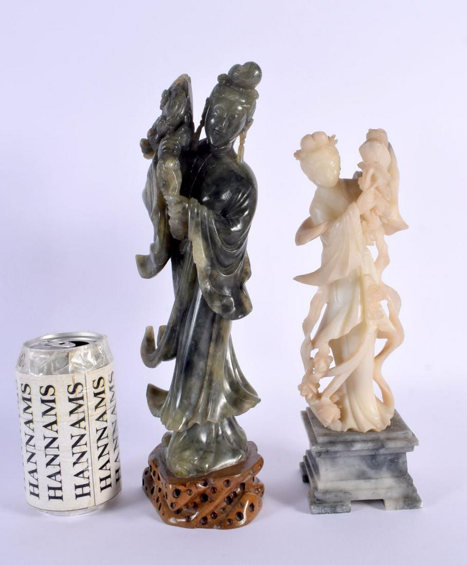 A LARGE 19TH CENTURY CHINESE CARVED GREEN SOAPSTONE FIGURE OF AN IMMORTAL together with a smaller so (1 of 4)