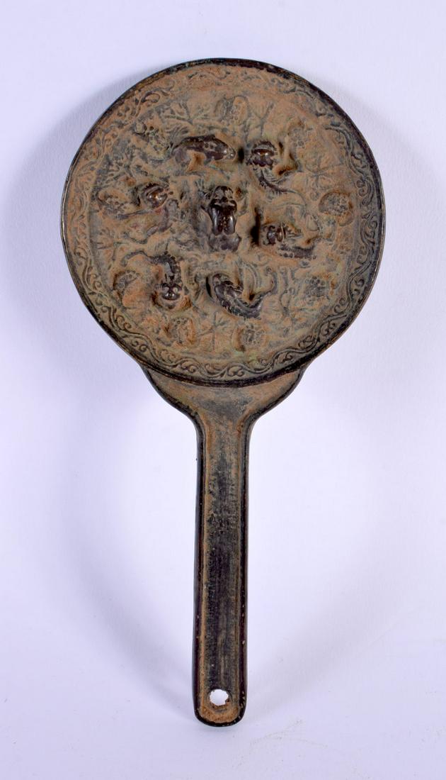 A CHINESE BRONZE MIRROR 20th Century. 18 cm x 9 cm.: A CHINESE BRONZE MIRROR 20th Century. 18 cm x 9 cm.