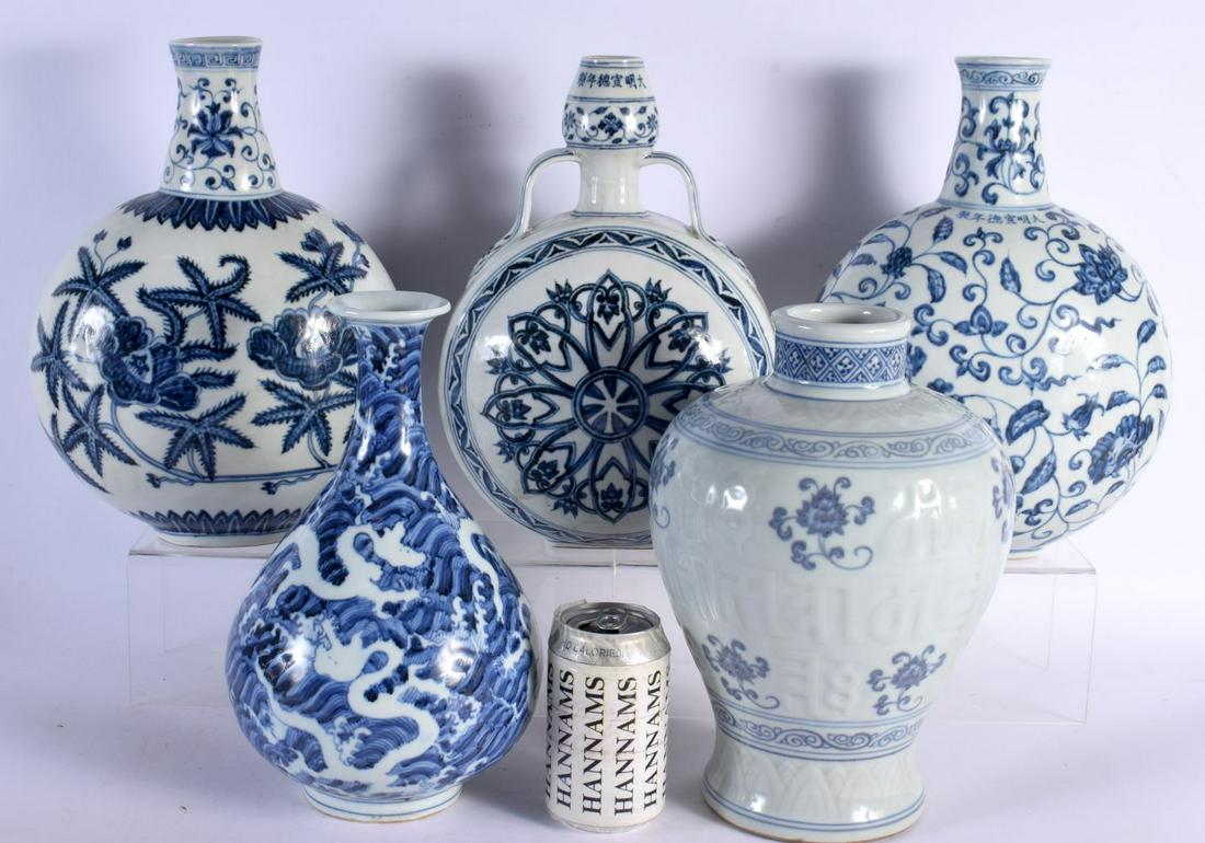 A GROUP OF FIVE CHINESE BLUE AND WHITE PORCELAIN VASES AND FLASKS 20th Century, painted with flowers: A GROUP OF FIVE CHINESE BLUE AND WHITE PORCELAIN VASES AND FLASKS 20th Century, painted with flowers and vines. Largest 32 cm x 20 cm. (5)
