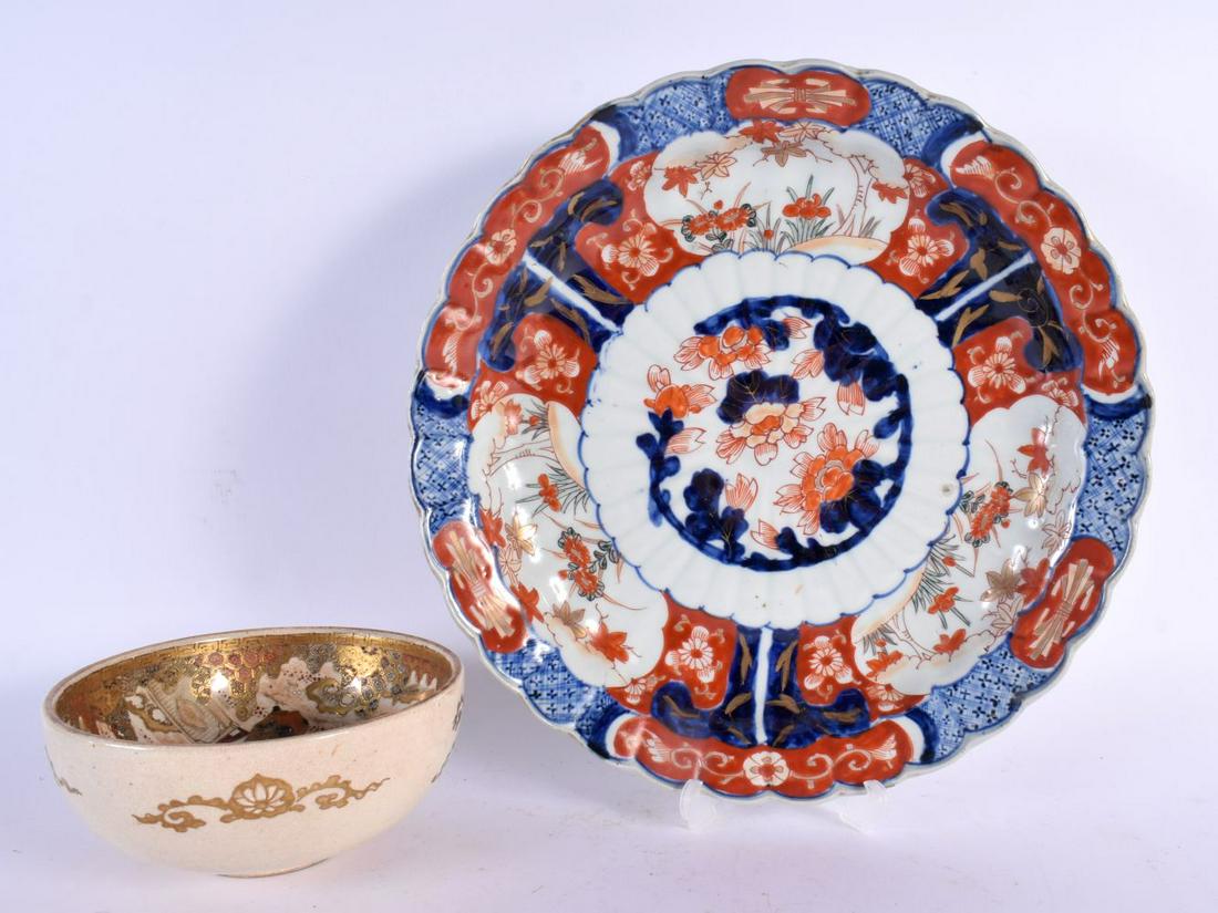 A 19TH CENTURY JAPANESE MEIJI PERIOD IMARI PLATE and a satsuma bowl. Largest 32 cm wide. (2): A 19TH CENTURY JAPANESE MEIJI PERIOD IMARI PLATE and a satsuma bowl. Largest 32 cm wide. (2)