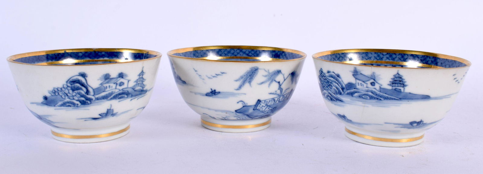 THREE 18TH CENTURY CHINESE EXPORT BLUE AND WHITE TEABOWLS Qianlong. 9 cm diameter. (3) (1 of 4)