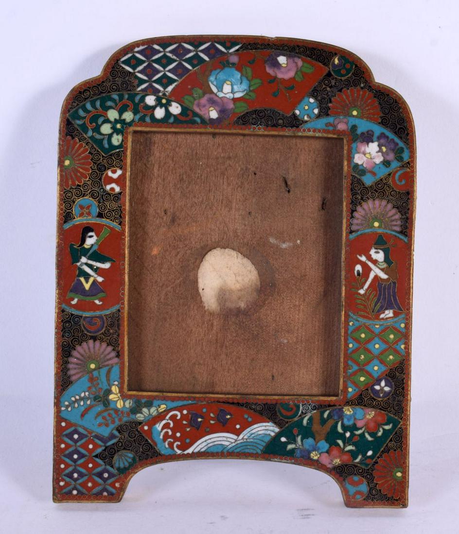 A RARE 19TH CENTURY JAPANESE MEIJI PERIOD CLOISONNE ENAMEL PHOTOGRAPH FRAME decorated with Egyptian: A RARE 19TH CENTURY JAPANESE MEIJI PERIOD CLOISONNE ENAMEL PHOTOGRAPH FRAME decorated with Egyptian figures. 15 cm x 12 cm.