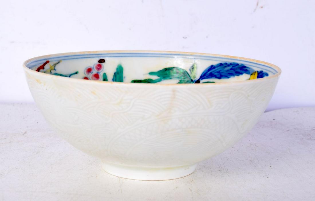 A Chinese porcelain Doucai floral Tea cup decorated with foliage 5 x 12 cm. (1 of 4)