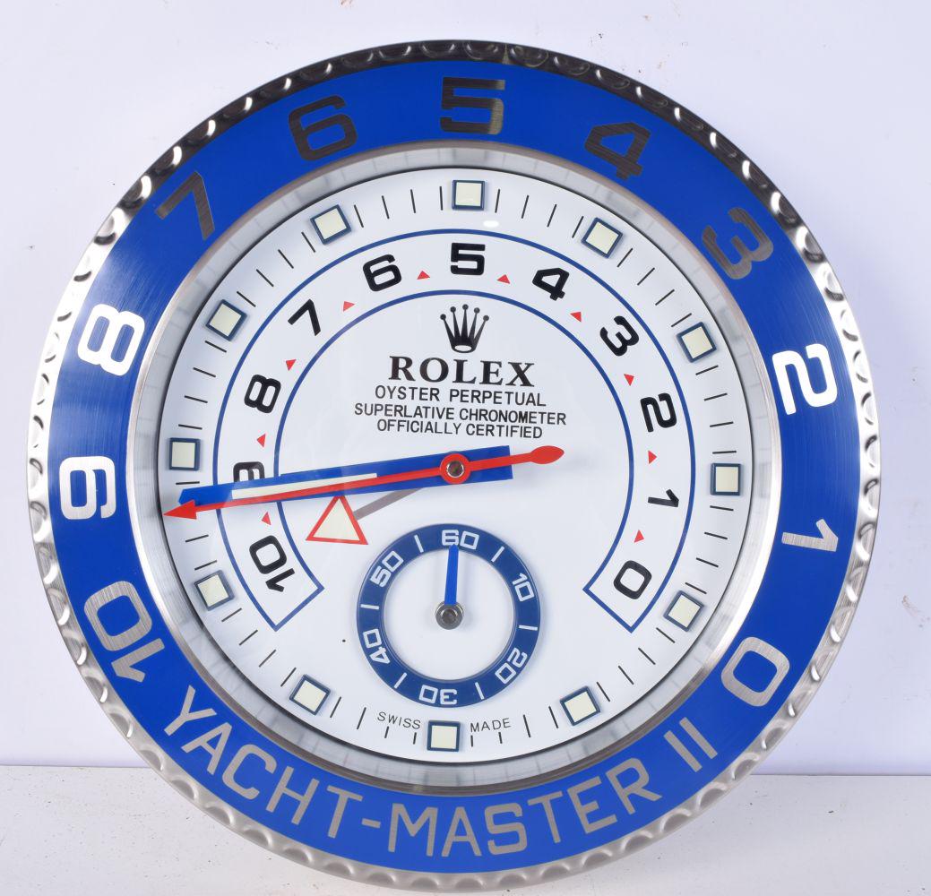 A Contemporary Rolex dealership style  wall clock 34 cm. (1 of 2)
