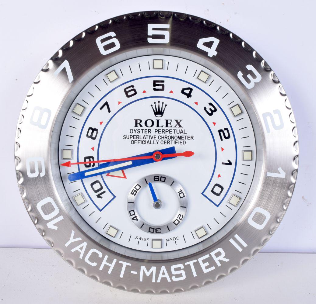 A Contemporary Rolex dealership style  wall clock 34 cm. (1 of 2)