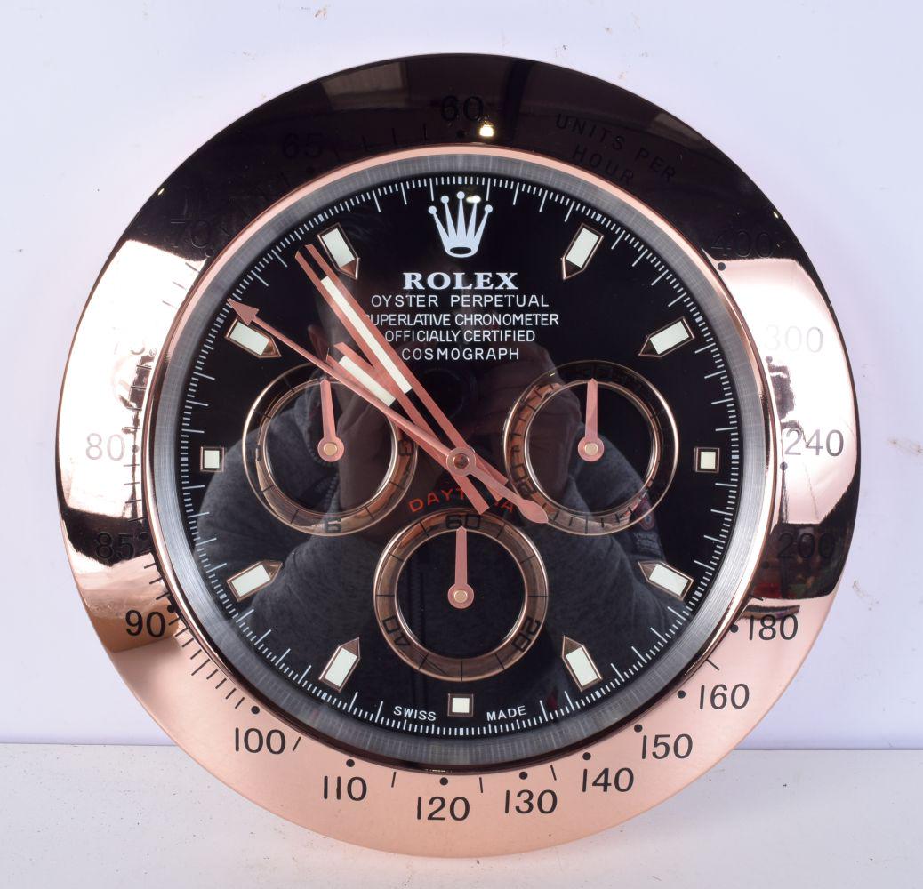 A Contemporary Rolex dealership style wall clock 34 cm.: A Contemporary Rolex dealership style wall clock 34 cm.