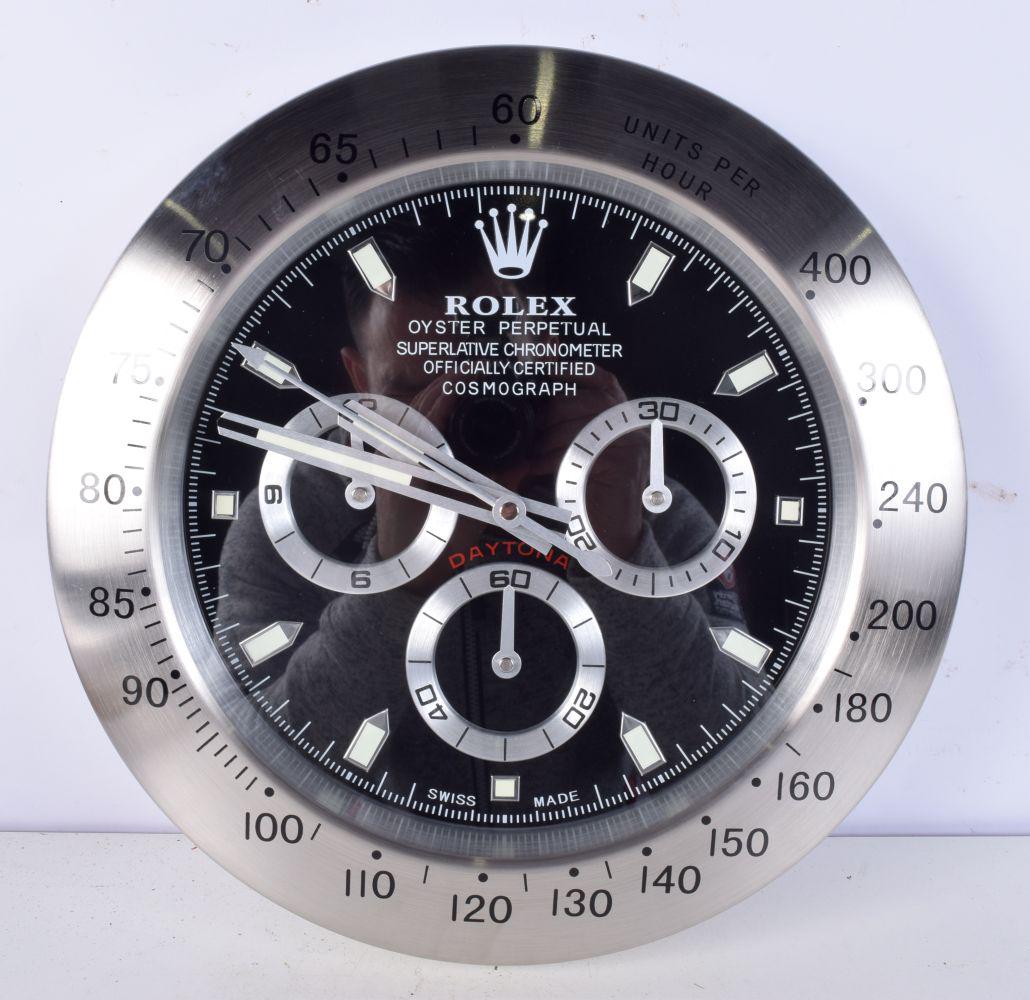 A Contemporary Rolex dealership style wall clock 34 cm.: A Contemporary Rolex dealership style wall clock 34 cm.