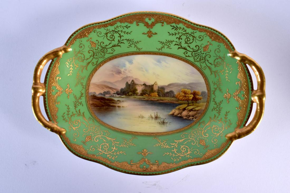 Early 20th c. Coalport two handled dish painted with a named scene of Tintern Abbey surround by a gr (1 of 2)