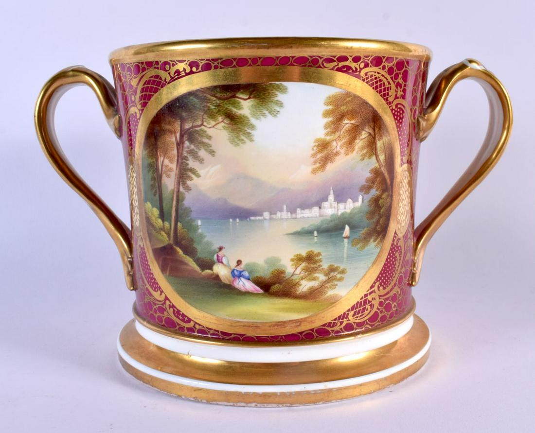 English porcelain two handled loving cup painted with two landscape c.1850, probably Coalport. 14Cm (1 of 4)