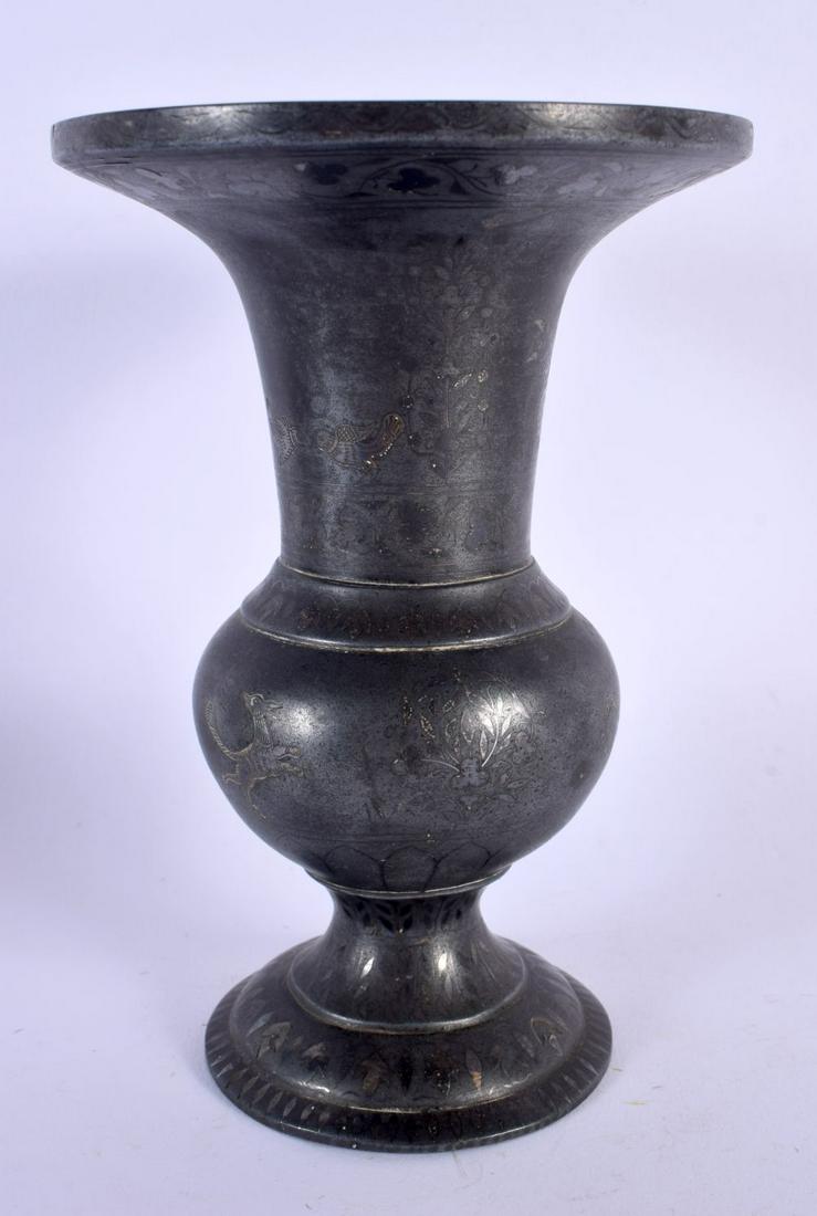 A 19TH CENTURY MIDDLE EASTERN SILVER INLAID STEEL BEAKER VASE decorated with figures. 17 cm high. (1 of 5)