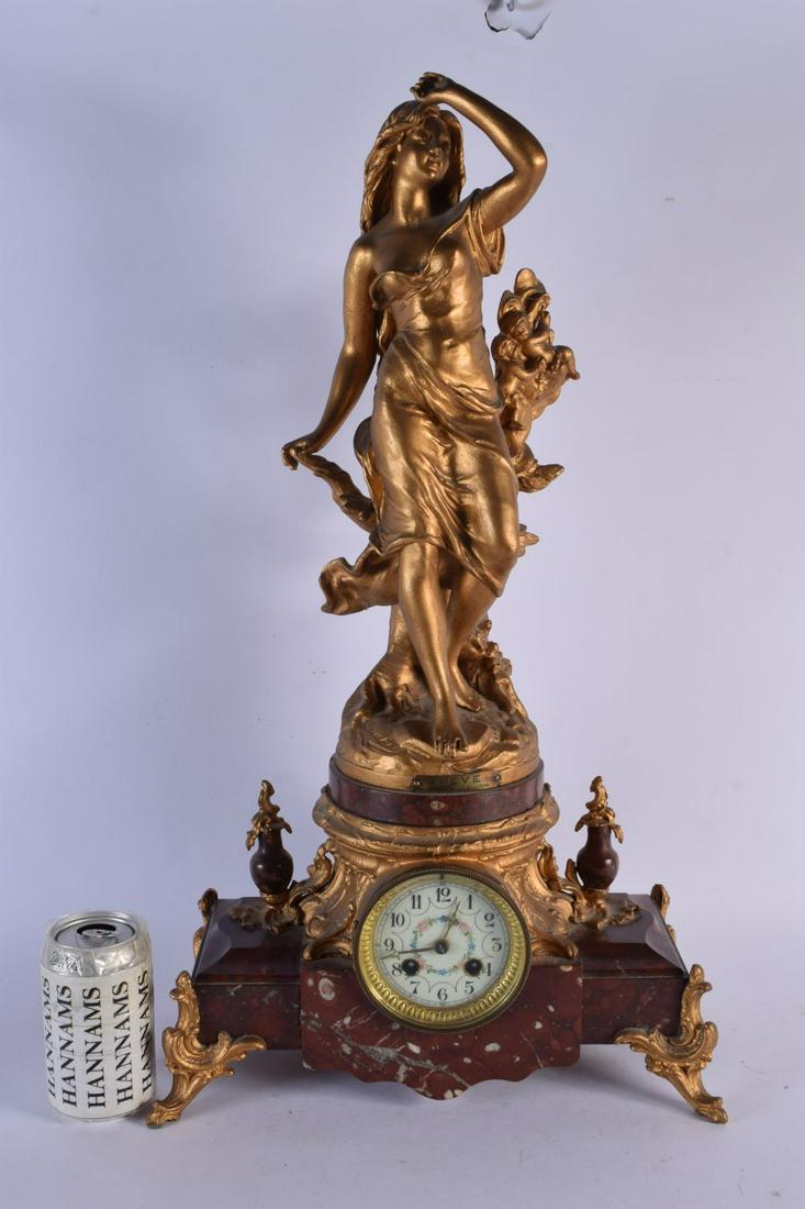 A LARGE LATE 19TH CENTURY FRENCH GILDED SPELTER MANTEL CLOCK upon a rouge marble base. 60 cm x 30 cm (1 of 7)