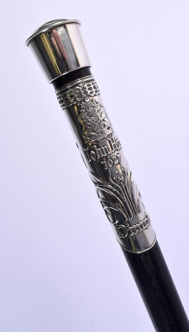 A RARE ANTIQUE CONTINENTAL SILVER NOVELTY WHISKEY DECANTING WALKING CANE decorated with foliage. 90 (1 of 5)
