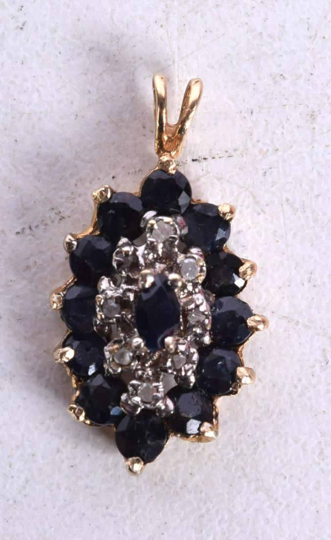 A 14CT GOLD PENDANT SET WITH PRECIOUS STONES.  Stamped 14K, 2.3cm x 1.2cm, weight 1.9g (1 of 2)