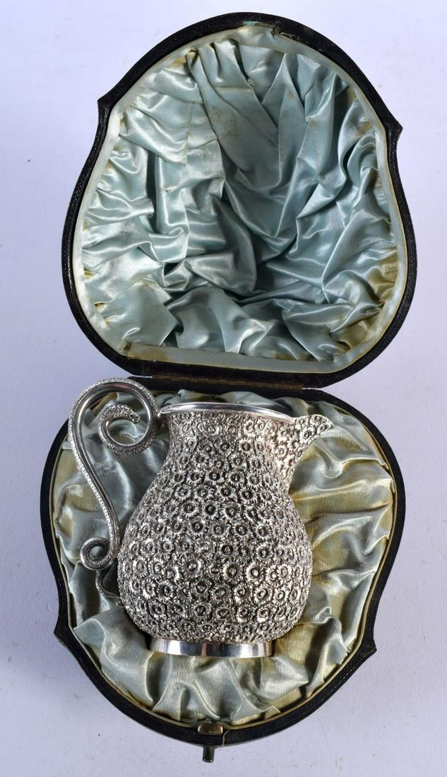 A FINE 19TH CENTURY INDIAN SILVER JUG with serpent handle. 178.8 grams. 10 cm x 10.5 cm. (1 of 5)