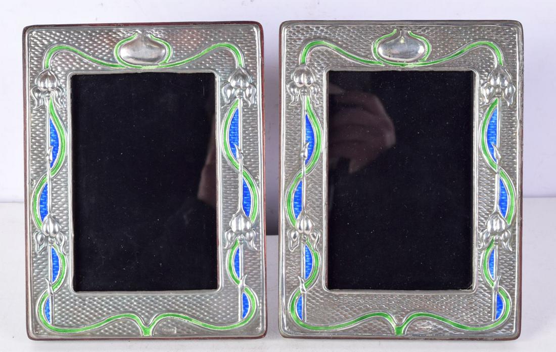 A PAIR OF SILVER ART NOUVEAU STYLE PICTURE FRAMES.  Stamped Sterling, 19.5cm x 14.7cm (2) (1 of 3)