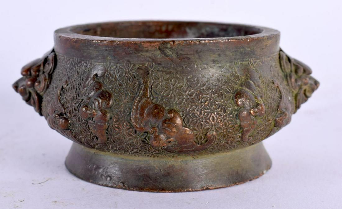 A CHINESE TWIN HANDLED BRONZE CENSER 20th Century, with Buddhistic mask head handles. 8.5 cm wide, i (1 of 4)