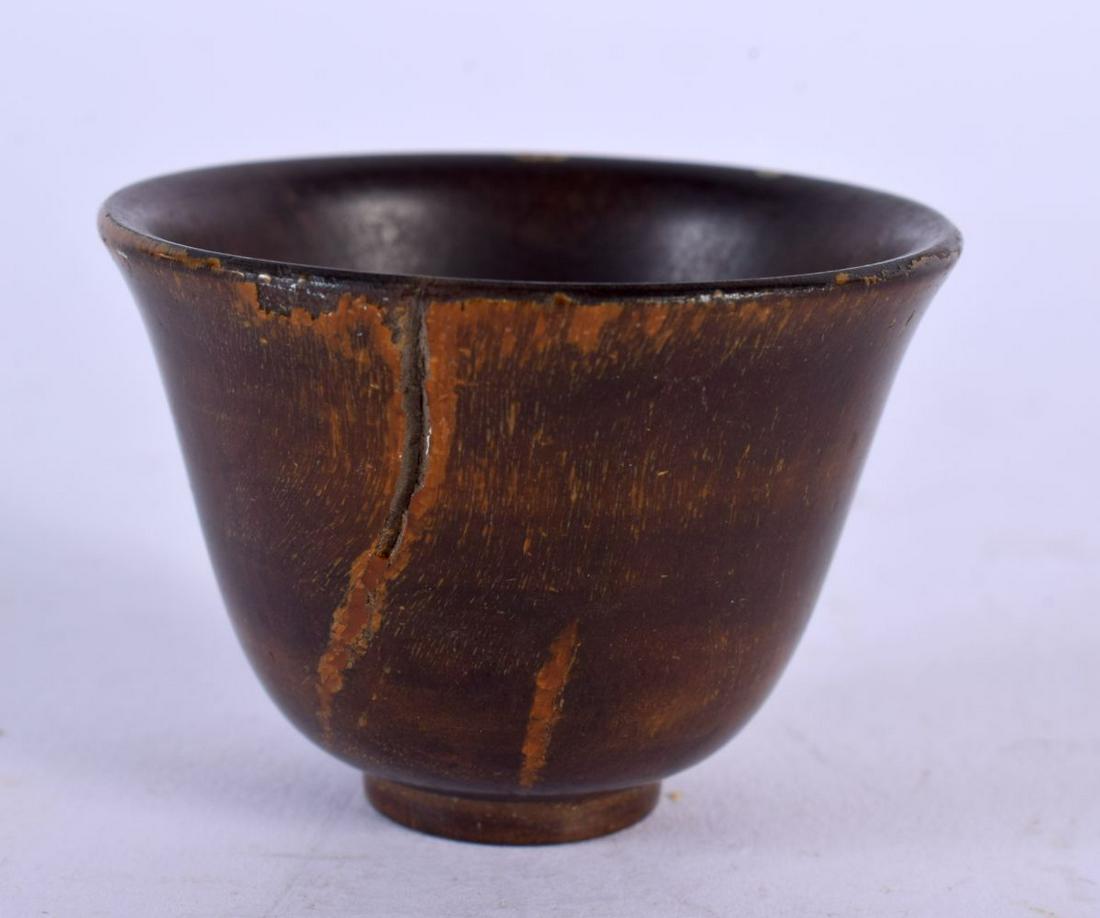 A 19TH CENTURY MIDDLE EASTERN CARVED RHINOCEROS HORN TEABOWL. 17 grams. 5 cm wide. (1 of 4)