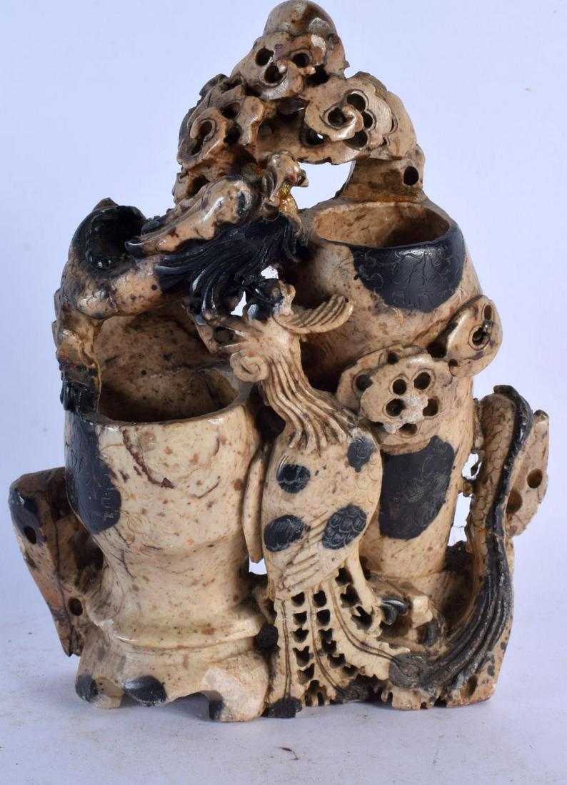 A 19TH CENTURY CHINESE CARVED SOAPSTONE MOUNTAIN VASE formed with phoenix and dragons. 21 cm x 14 cm (1 of 4)