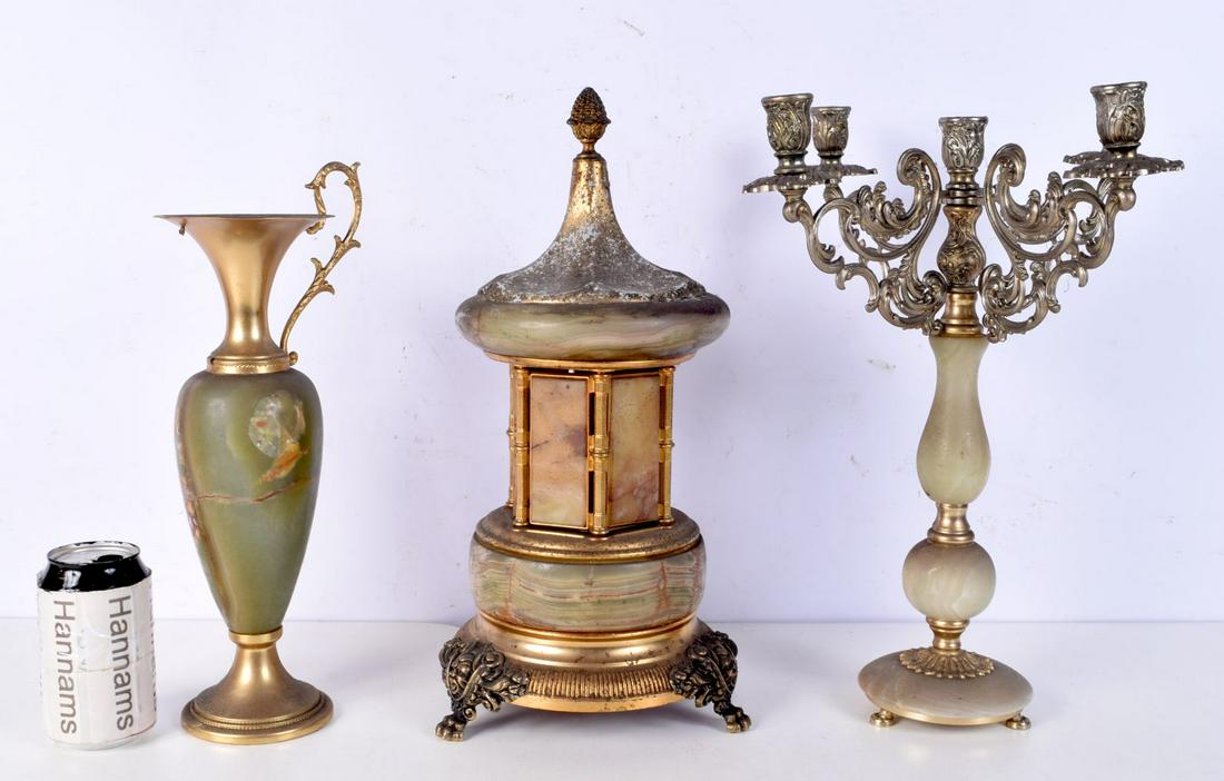 An Italian Onyx and brass musical ornament together with an Onyx and metal  candle holder and an urn (1 of 3)