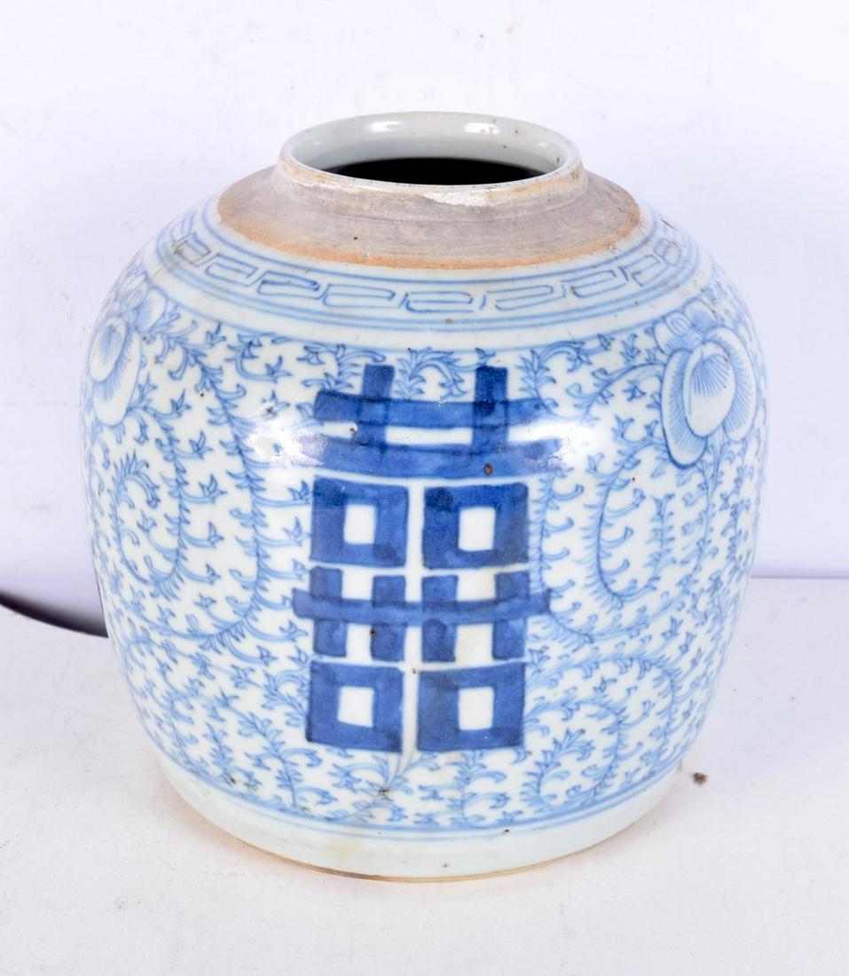 A 19th century Chinese blue and white porcelain ginger jar, decorated with symbols and foliage. 19 c: A 19th century Chinese blue and white porcelain ginger jar, decorated with symbols and foliage. 19 cm x 17.5 cm.