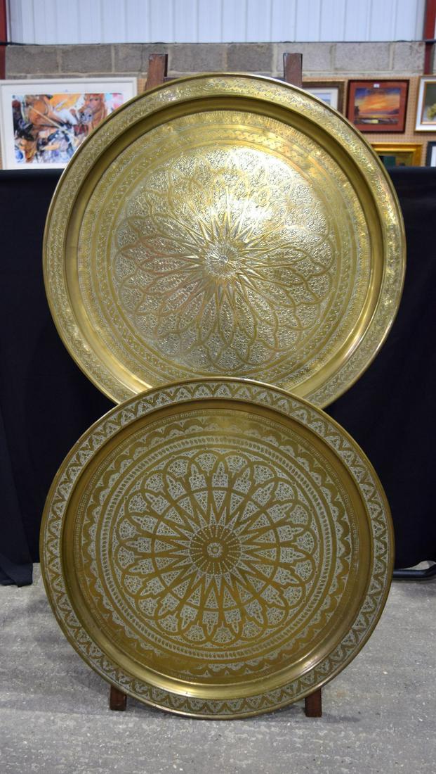 A pair of huge Islamic embossed trays decorated with geometric patters. 97 cm (2). (1 of 5)