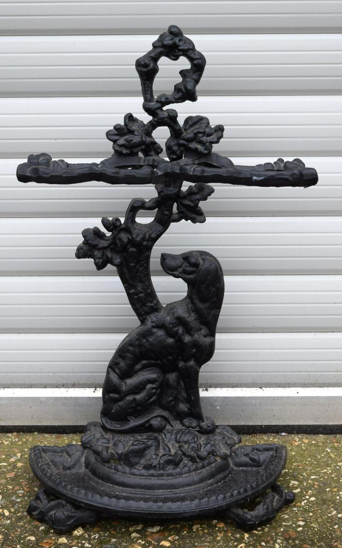 An antique cast iron stick stand 68 cm: An antique cast iron stick stand 68 cm