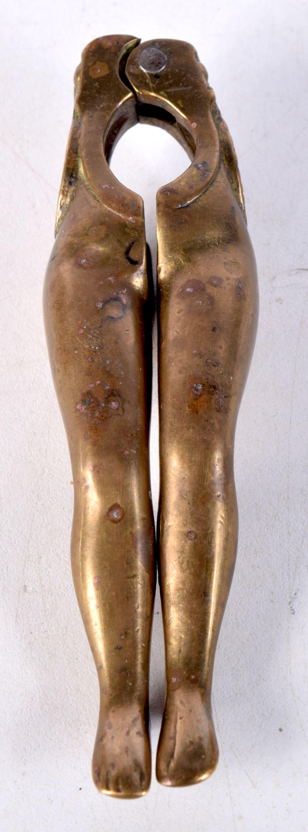 A pair of 19th Century bronze nut crackers in the form of ladies legs 12 cm. (1 of 3)