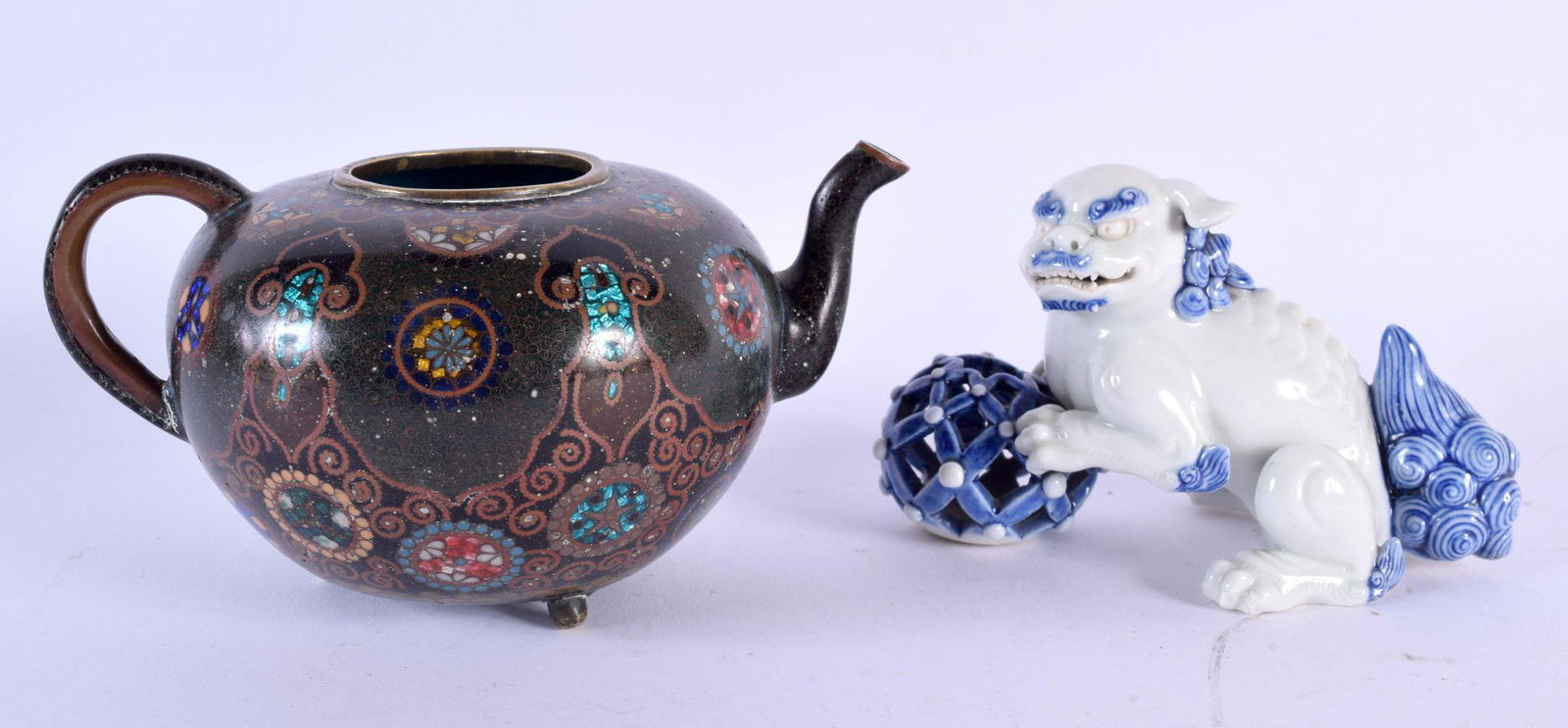 A 19TH CENTURY JAPANESE MEIJI PERIOD HIRADO PORCELAIN BEAST together with a cloisonne enamel teapot (1 of 9)