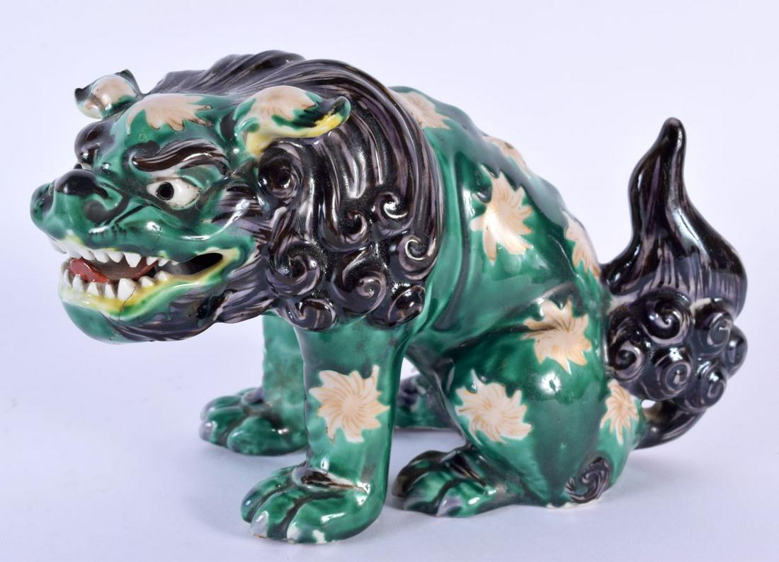 A 19TH CENTURY JAPANESE MEIJI PERIOD AO KUTANI PORCELAIN FIGURE modelled as a scowling beast. 22 cm (1 of 5)