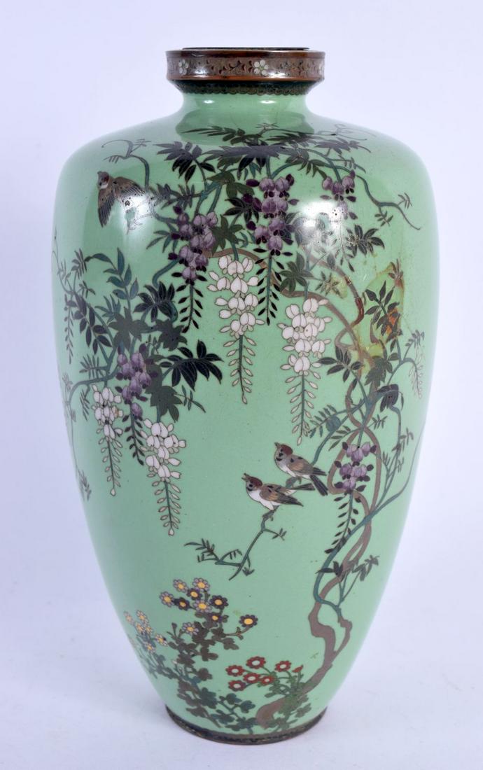 A 19TH CENTURY JAPANESE MEIJI PERIOD CLOISONNE ENAMEL VASE decorated with birds in flight upon an ap (1 of 6)