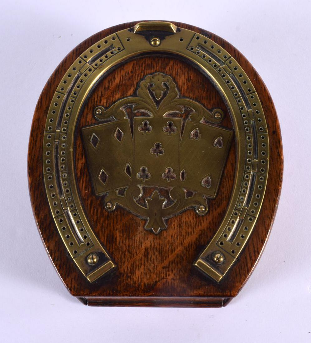A LOVELY 19TH CENTURY EQUESTRIAN OAK AND BRASS CRIBBAGE BOARD formed as a horse shoe. 16 cm x 13 cm. (1 of 5)