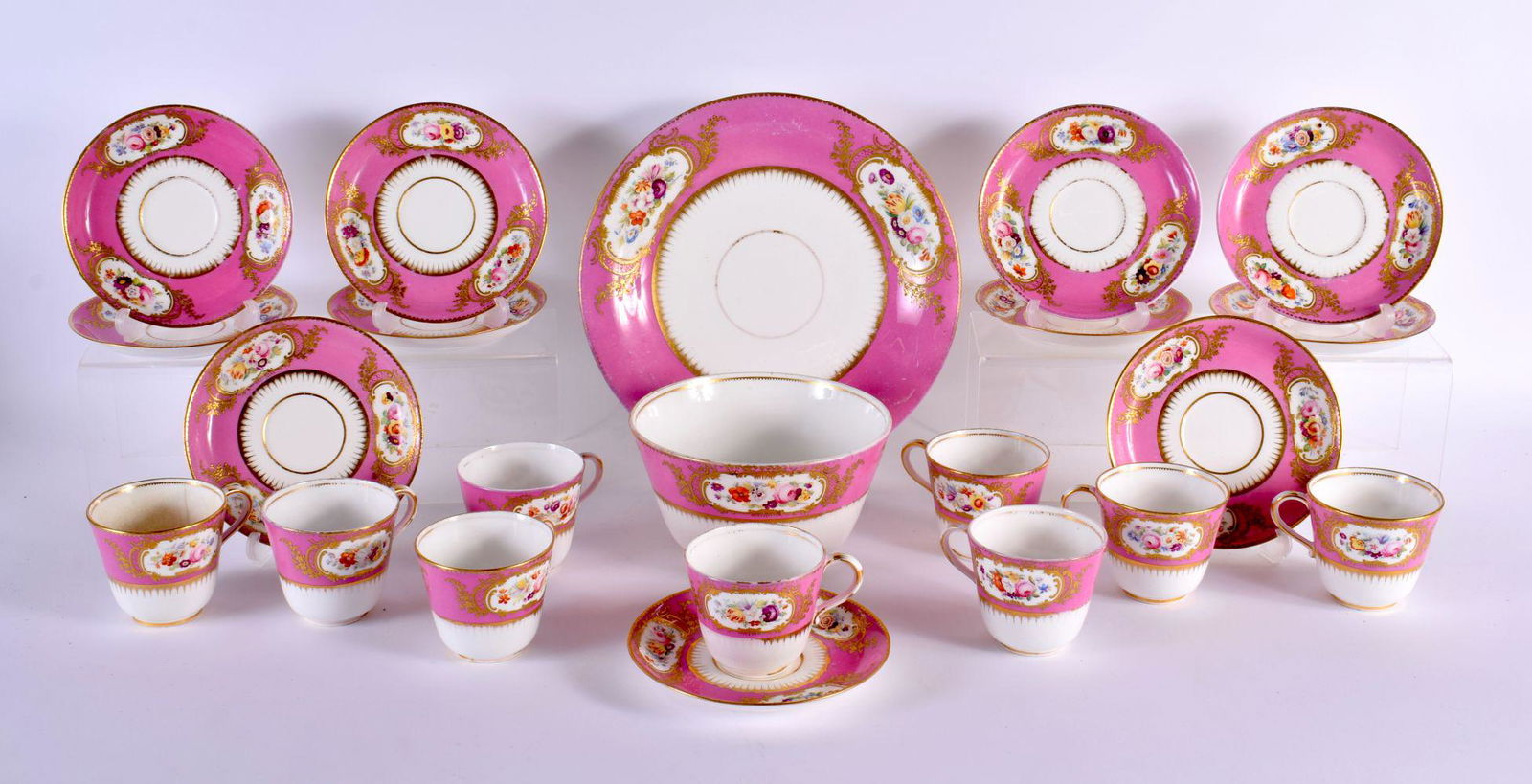 A 19TH CENTURY ENGLISH PORCELAIN PINK GROUND DESSERT SERVICE painted with flowers and vines. Largest (1 of 20)