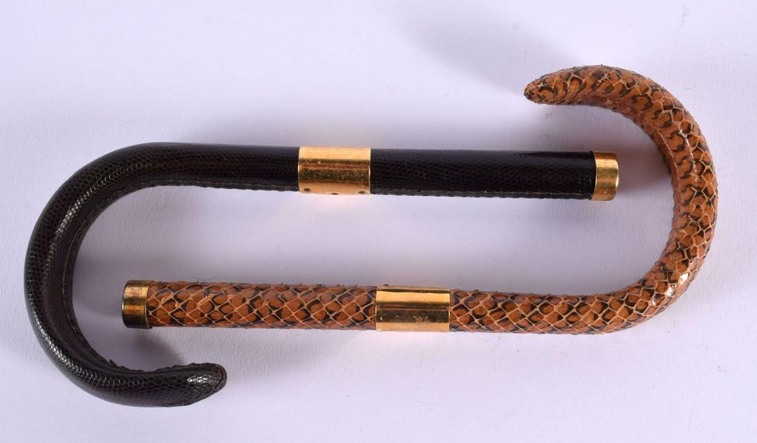 TWO VINTAGE SNAKESKIN CANE HANDLES. 18 cm long. (2) (1 of 4)