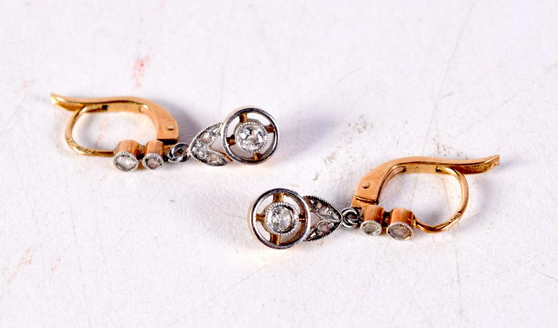 A PAIR OF GOLD DIAMOND AND RUBY EARRINGS. 2.3 grams. 2 cm long. (1 of 3)