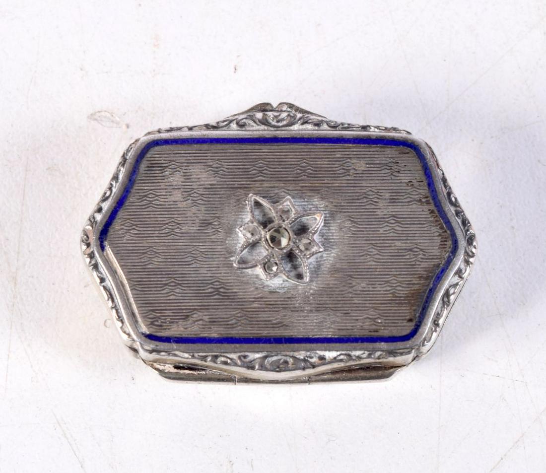 A SILVER AND ENAMEL PILL BOX. 10.3 grams. 3.5 cm x 2.5 cm. (1 of 3)
