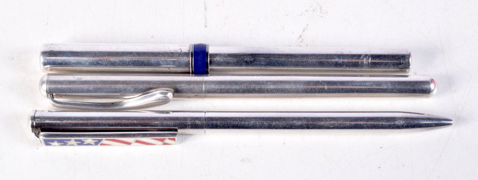 THREE TIFFANY & CO SILVER PENS. 74.7 grams. 13 cm long. (3) (1 of 2)
