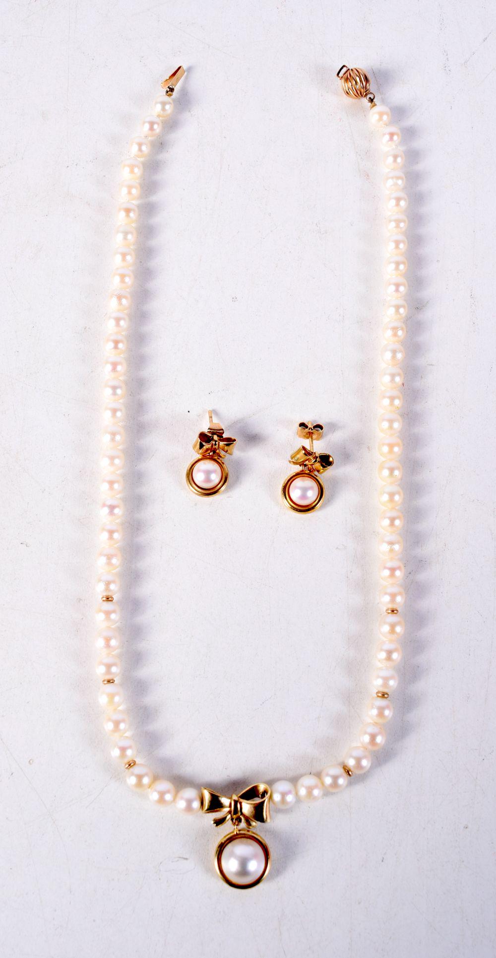 A 9CT GOLD AND PEARL GARNITURE. 24.8 grams. Largest 40 cm long. (3) (1 of 3)