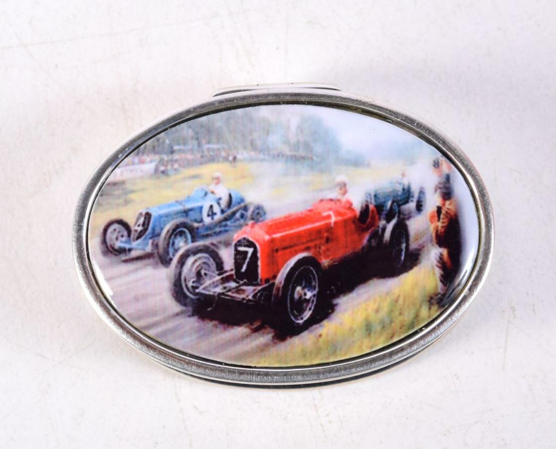 A SILVER RACING CAR PILL BOX. 19 grams. 3.75 cm x 2.5 cm.: A SILVER RACING CAR PILL BOX. 19 grams. 3.75 cm x 2.5 cm.