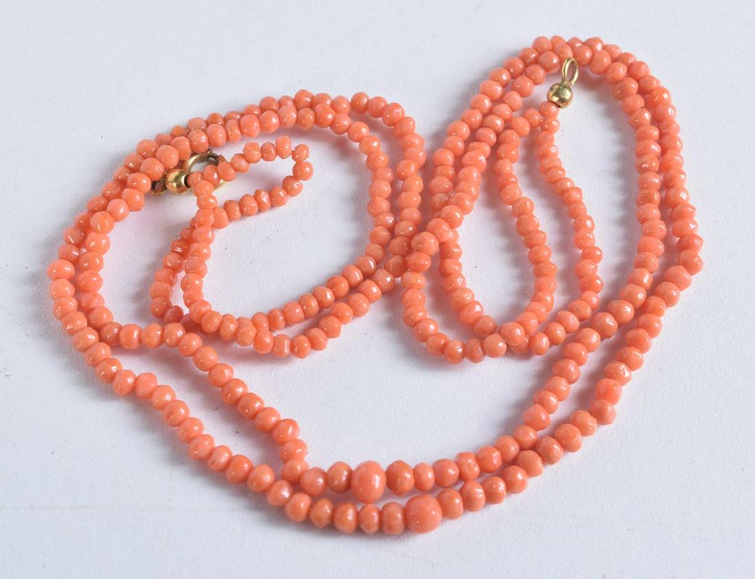 AN ART DECO DOUBLE CORAL NECKLACE. 13.3 grams. 41 cm long. (1 of 3)