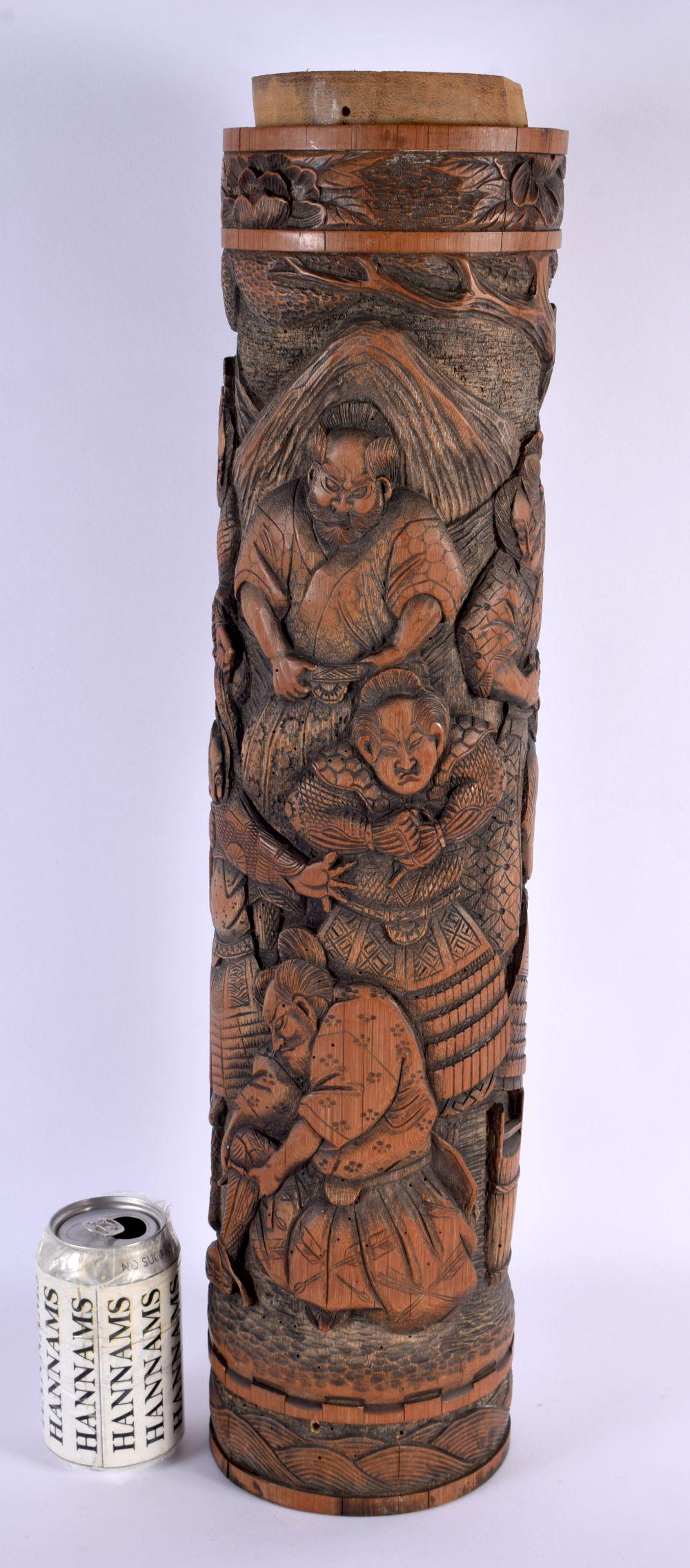 A LARGE 19TH CENTURY JAPANESE MEIJI PERIOD BAMBOO VASE unusually well carved with samurai within lan: A LARGE 19TH CENTURY JAPANESE MEIJI PERIOD BAMBOO VASE unusually well carved with samurai within landscapes. 56 cm high.