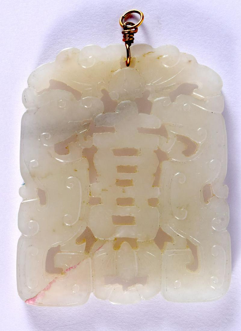 A 19TH CENTURY CHINESE WHITE JADE PENDANT Qing, carved with beasts and shou characters. 6.5 cm x 5.5 (1 of 2)