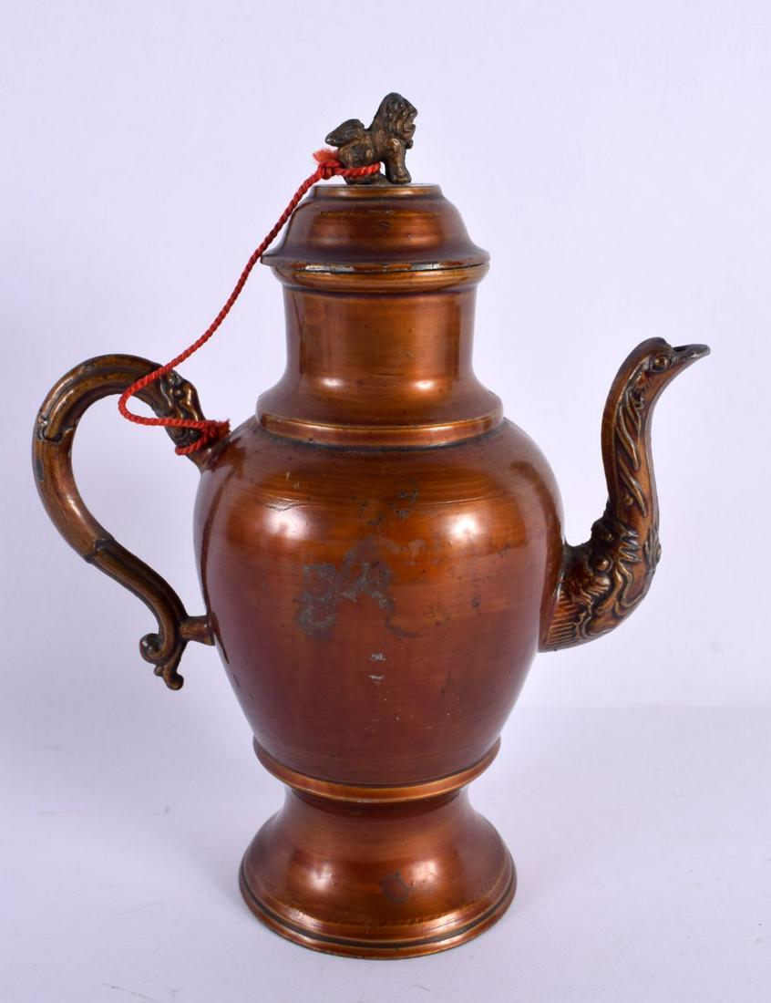 AN UNUSUAL 19TH CENTURY CHINESE PATINATED METAL PEWTER EWER Qing, with mask head spout. 18 cm high.: AN UNUSUAL 19TH CENTURY CHINESE PATINATED METAL PEWTER EWER Qing, with mask head spout. 18 cm high.