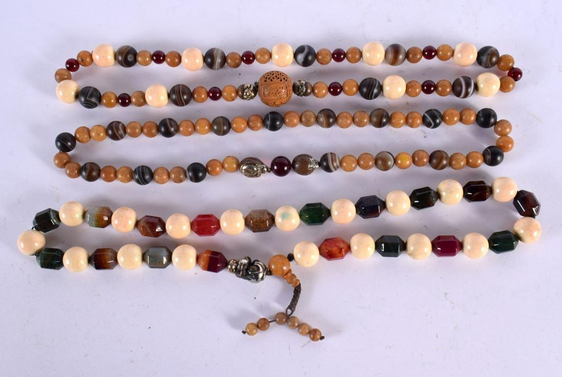 THREE CHINESE TIBETAN NECKLACES 20th Century. Largest 73 cm long. (3): THREE CHINESE TIBETAN NECKLACES 20th Century. Largest 73 cm long. (3)