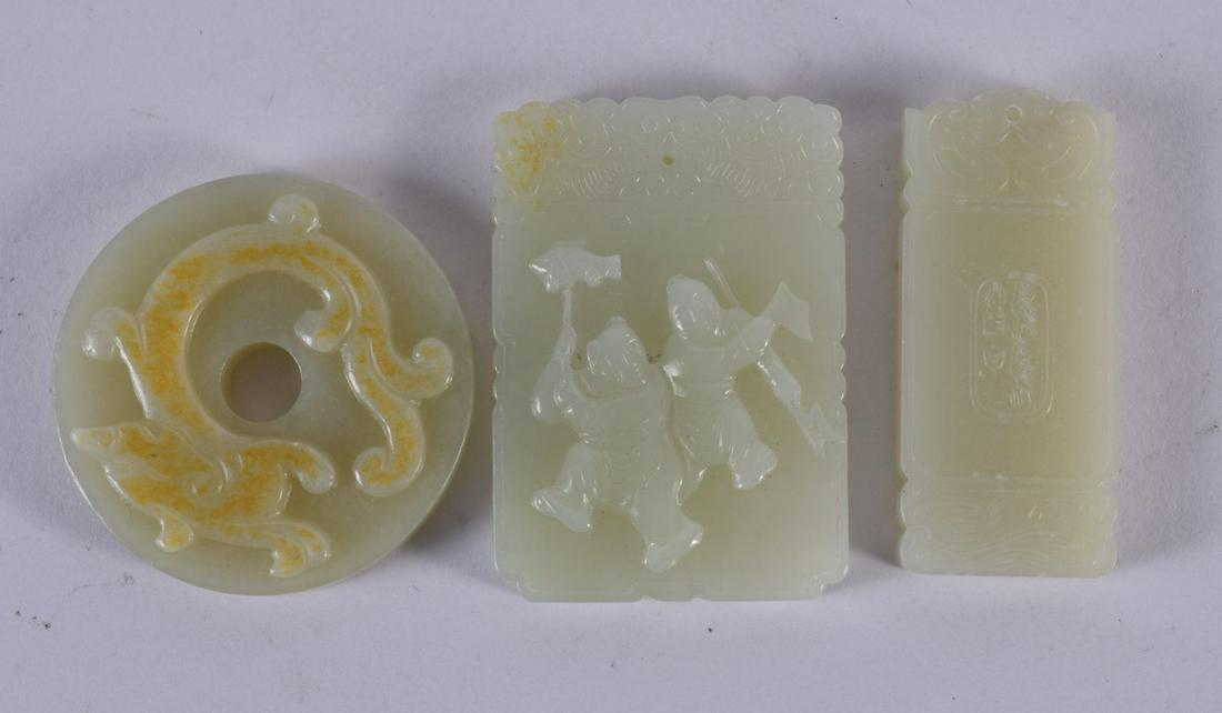 THREE CHINESE CARVED JADE PLAQUES 20th Century. Largest 6.5 cm x 4.5 cm. (3) (1 of 2)