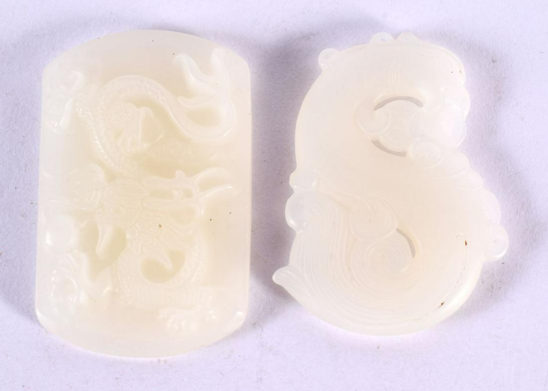 TWO CHINESE CARVED JADE PLAQUES 20th Century. Largest 5.5 cm x 3.5 cm. (2) (1 of 2)
