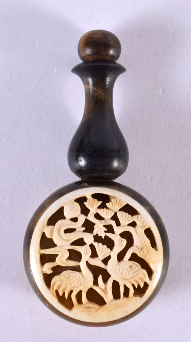 A CHINESE CARVED BONE AND HORN SNUFF BOTTLE 20th Century. 7 cm x 4 cm.: A CHINESE CARVED BONE AND HORN SNUFF BOTTLE 20th Century. 7 cm x 4 cm.