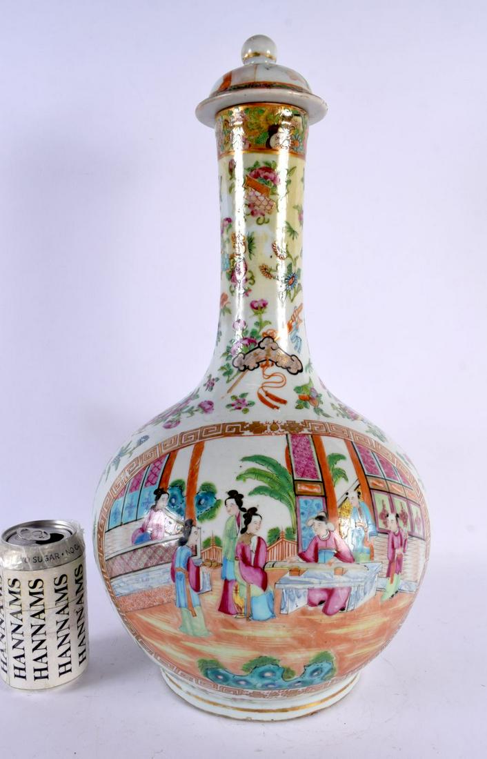A LARGE 19TH CENTURY CHINESE FAMILLE ROSE BOTTLE VASE AND COVER painted with figures in interiors. 4 (1 of 8)
